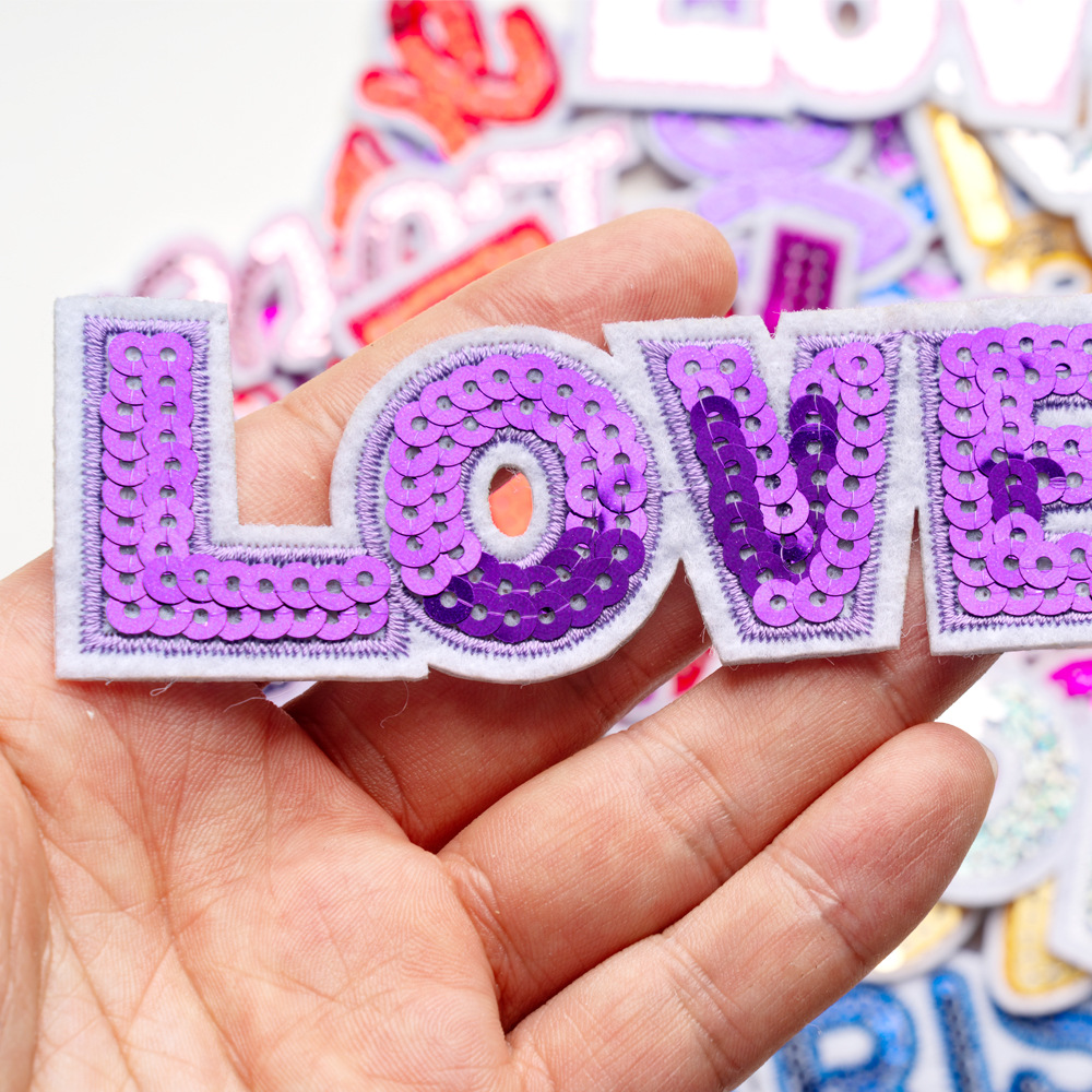 Colored Word LOVE Sequined Emb - Embroidery Font Free recension och pris